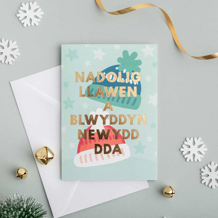 Christmas card 'Nadolig Llawen a Blwyddyn Newydd Dda' bobble hats - gold foil
