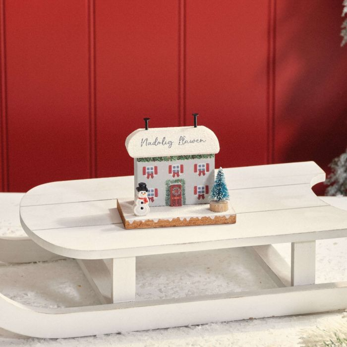 Welsh Nadolig Llawen wooden Christmas cottage with snowman