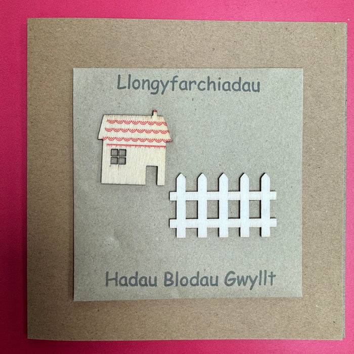 New home card 'Llongyfarchiadau' handmade with wild flower seeds - picket fence