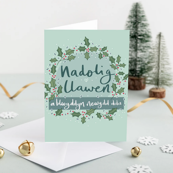 Welsh Christmas card 'Nadolig Llawen a blwyddyn newydd dda' holly wreath