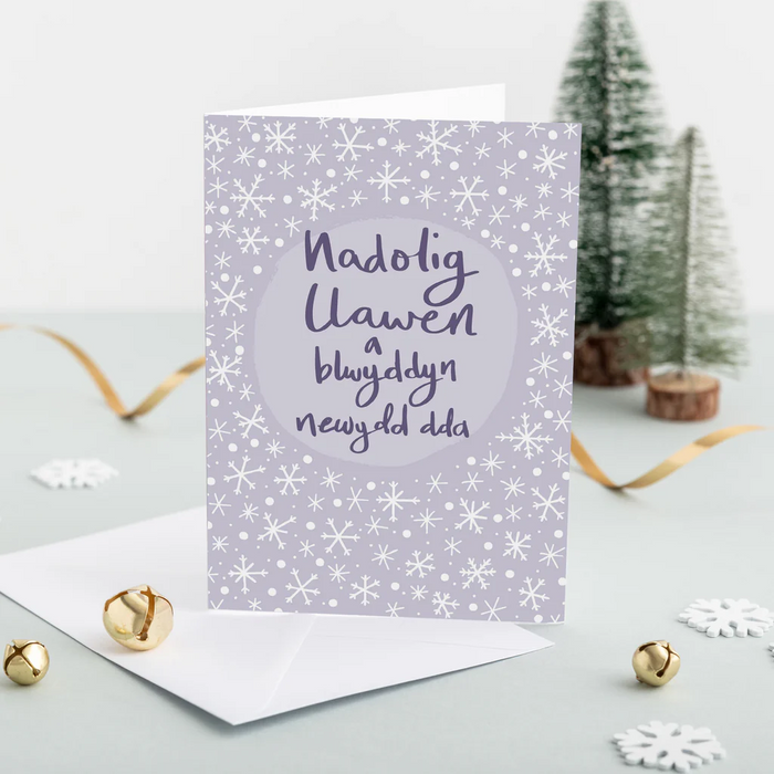 Welsh Christmas card 'Nadolig Llawen a blwyddyn newydd dda' snowflakes