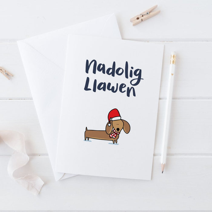 Christmas card 'Nadolig Llawen' Sausage dog / dachshund